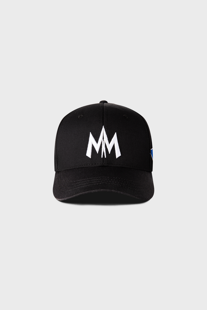 The Maison Menace Signature Hat in Black by MAISON MENACE is a cotton twill cap featuring an embroidered white MM logo on the front.
