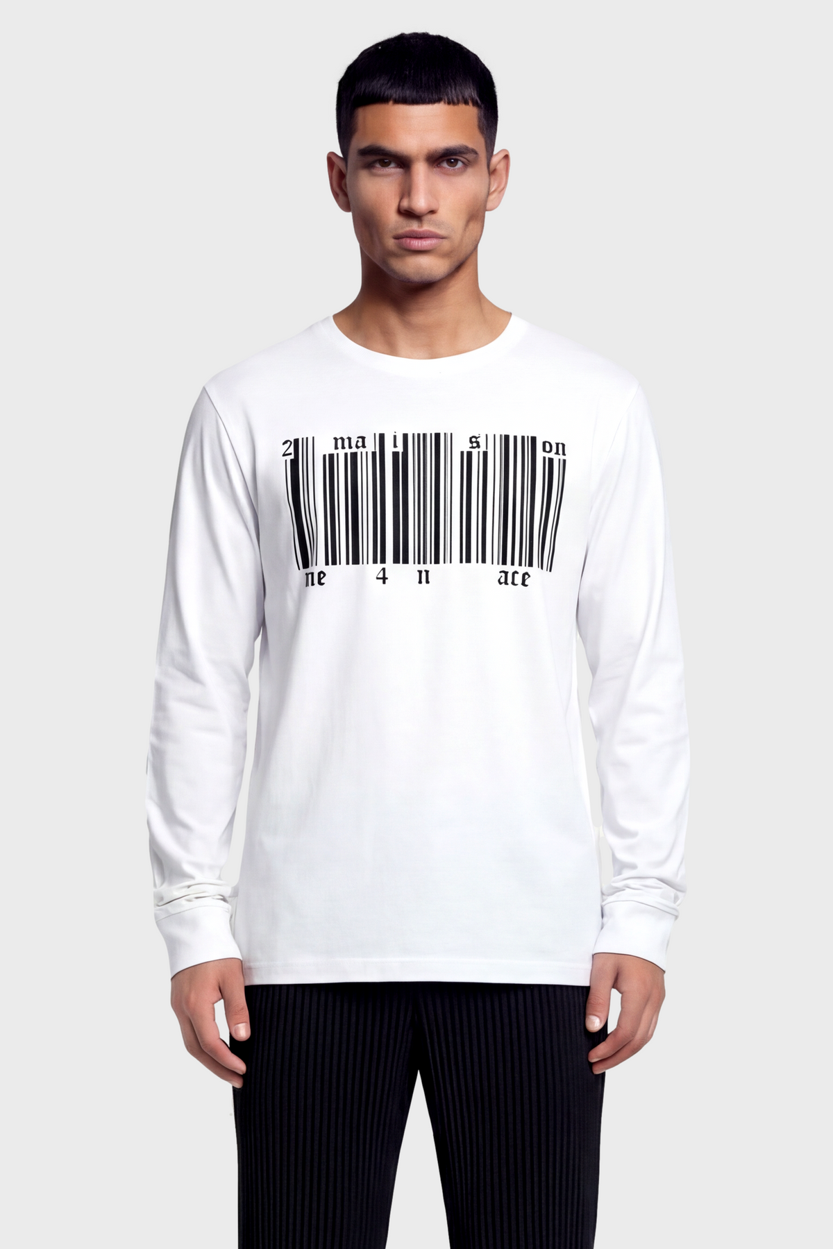Man wearing a white long-sleeve shirt with a barcode design on a plain background