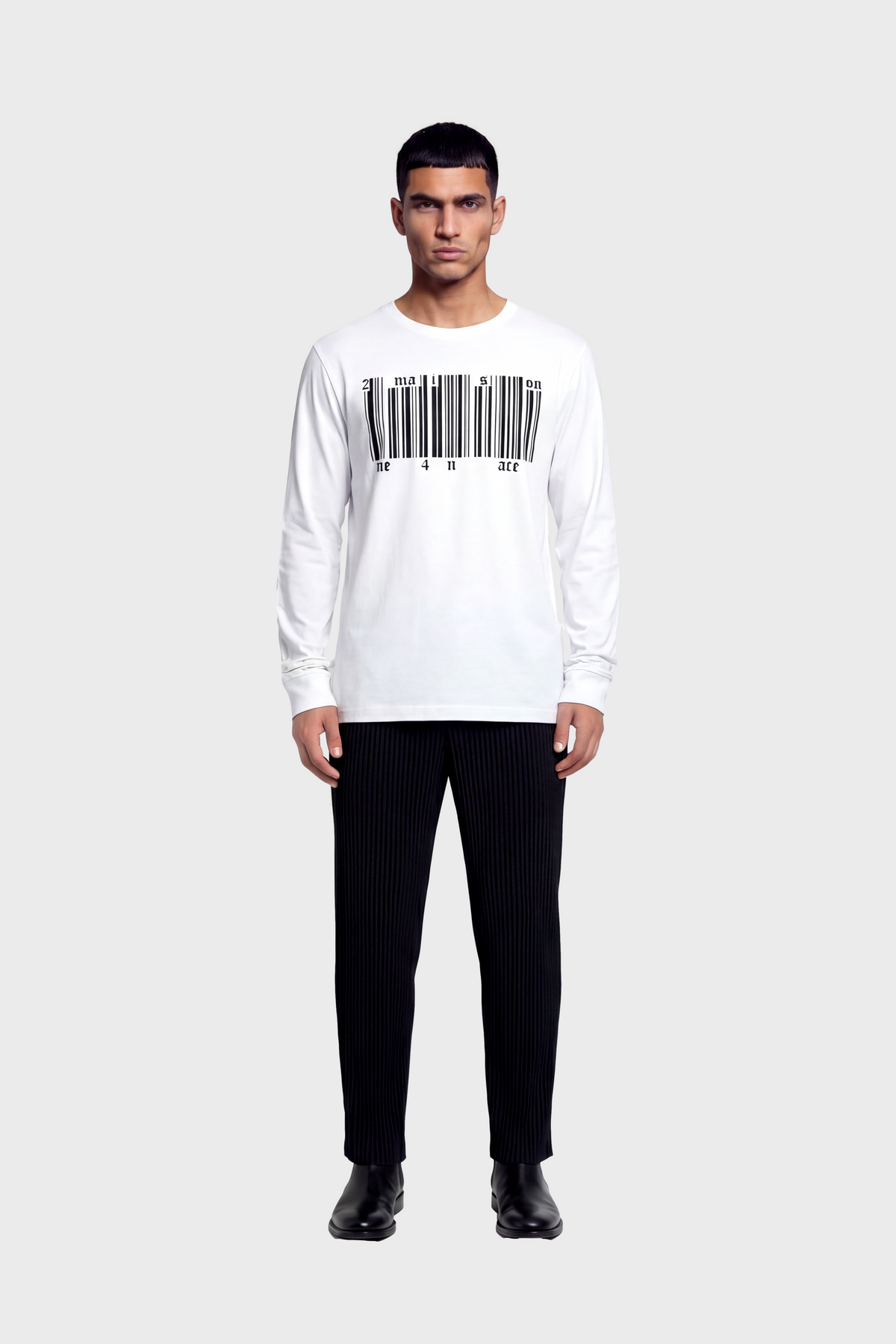 Man wearing a white long sleeve t-shirt with a barcode design on a white background