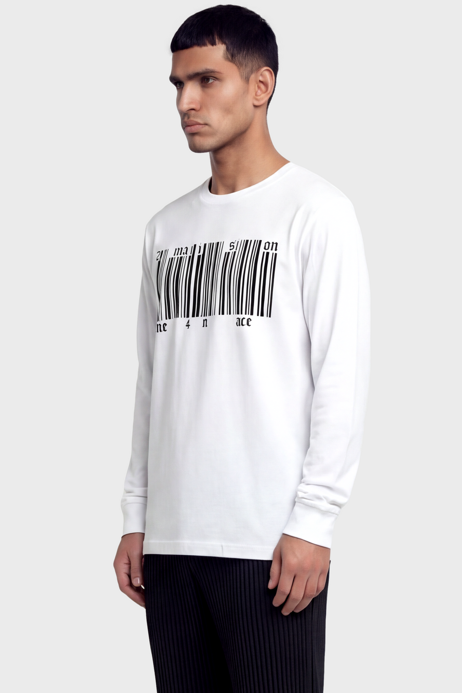 Man wearing a white long-sleeve shirt with a barcode design on a plain background