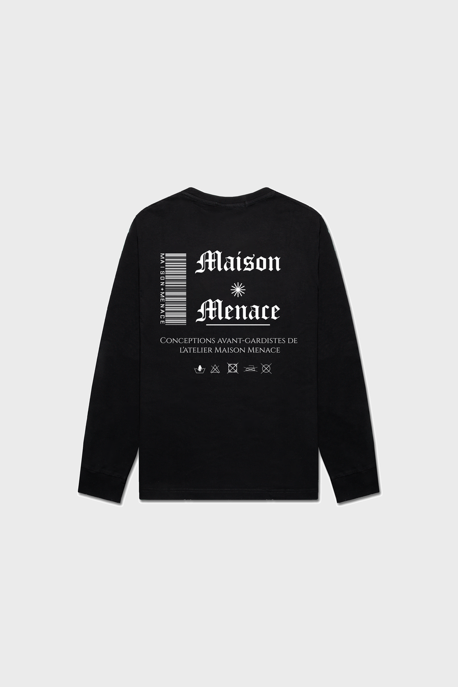 The Flag Long-Sleeve Shirt by MAISON MENACE is crafted from organic American SUPIMA® cotton and features a white graphic design with Maison Menace, care symbols, a star graphic, and a barcode-style element.