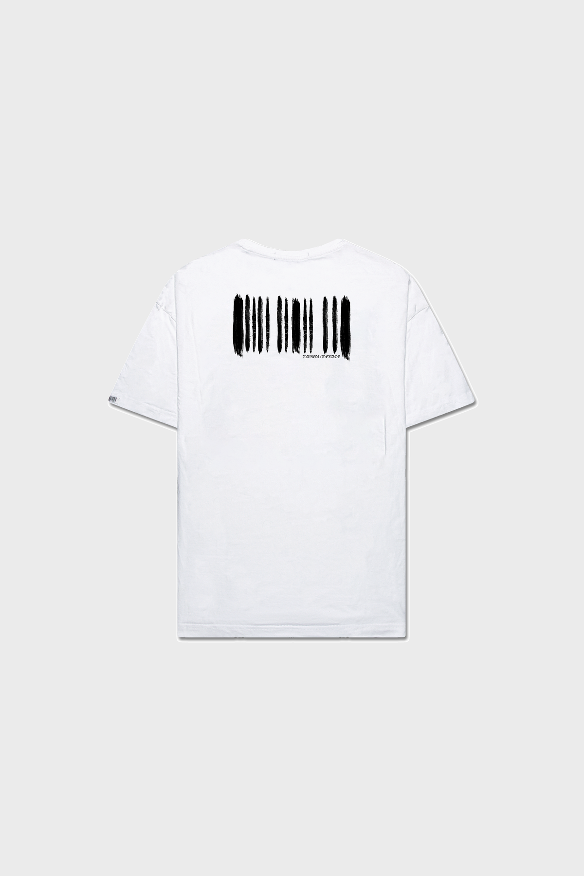The BARCODE PAINT T-SHIRT by MAISON MENACE features black brushstroke-like patterns vertically on the back, crafted from organic American-grown SUPIMA® cotton. The white T-shirt is displayed flat against a plain neutral background.