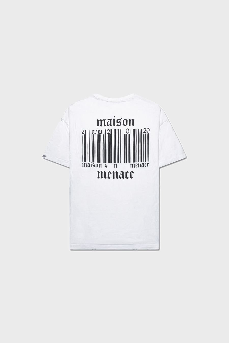 The Broken Barcode T-Shirt by MAISON MENACE is a white organic cotton tee with a striking barcode graphic on the back, featuring maison 4 menace in black text above and below. Its displayed elegantly against a plain gray background.