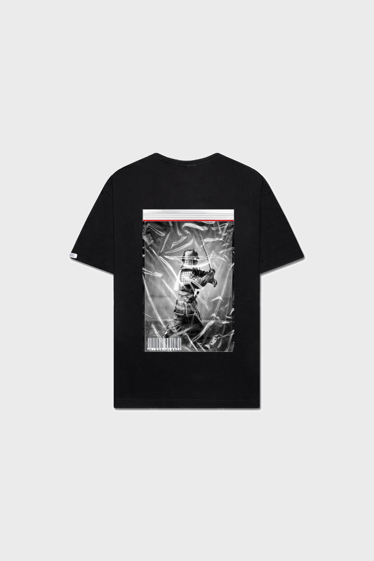 The Limited Edition Black MAISON MENACE Bushido T-Shirt, made from Organic American Grown SUPIMA® cotton, features a medieval knight in helmet and armor on the back with a plastic-wrapped effect against a plain gray background.