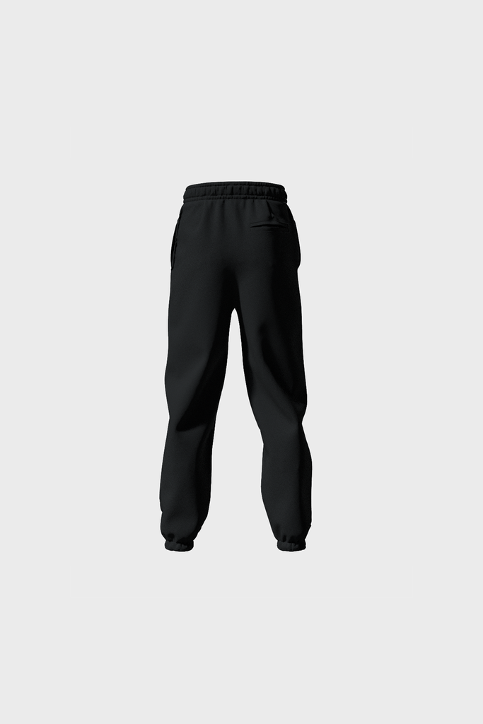 The Gothique Sweatpants by MAISON MENACE, featuring jet black cotton, an elastic waistband, and cuffs, made in Portugal, are displayed against a plain grey background.