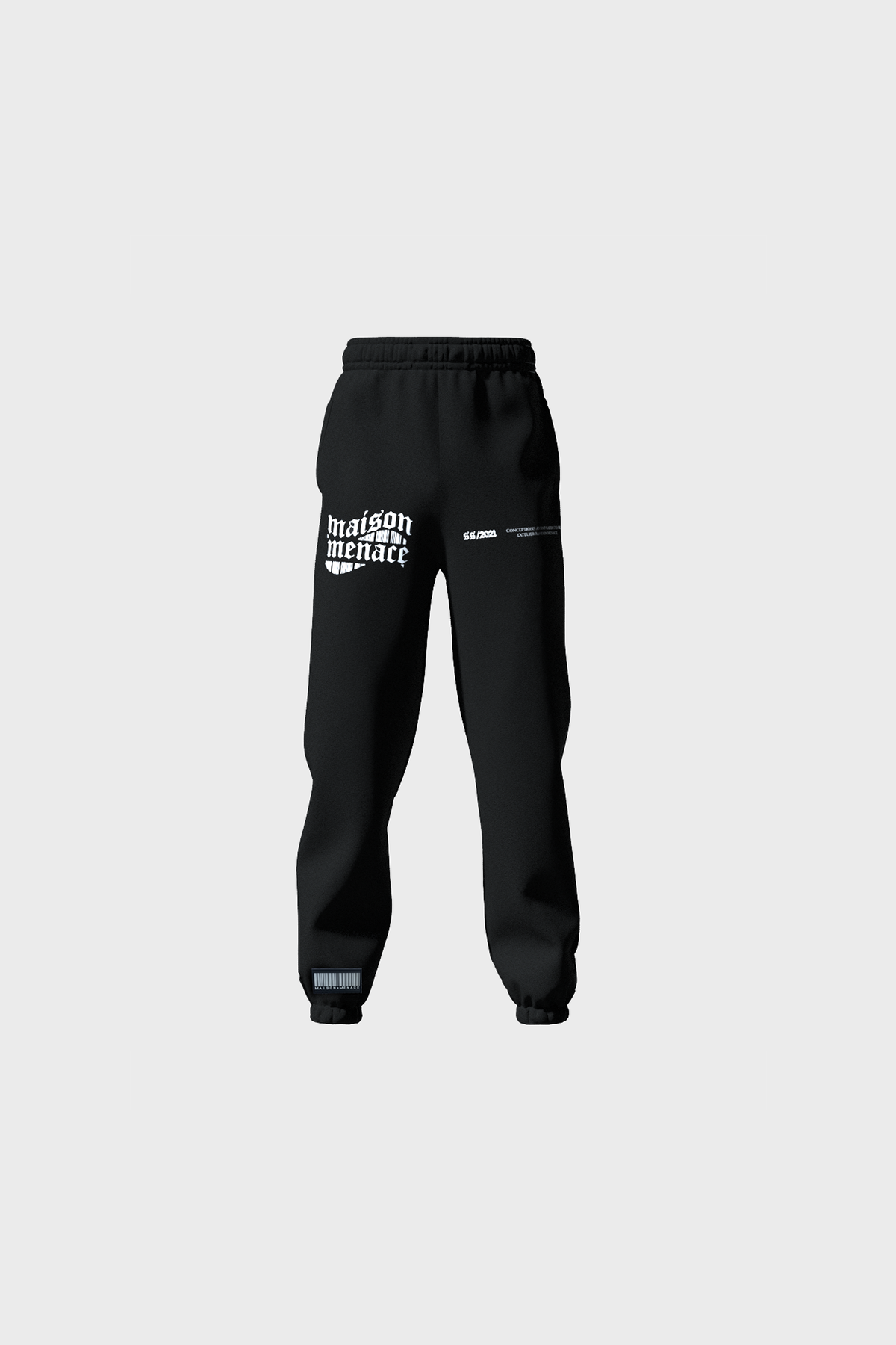 Jet black Gothique Sweatpants by MAISON MENACE feature maison menace on the left thigh and 06.2024 on the right. Crafted in Portugal with an elastic waistband and cuffs, these jogger pants are set against a light gray background.