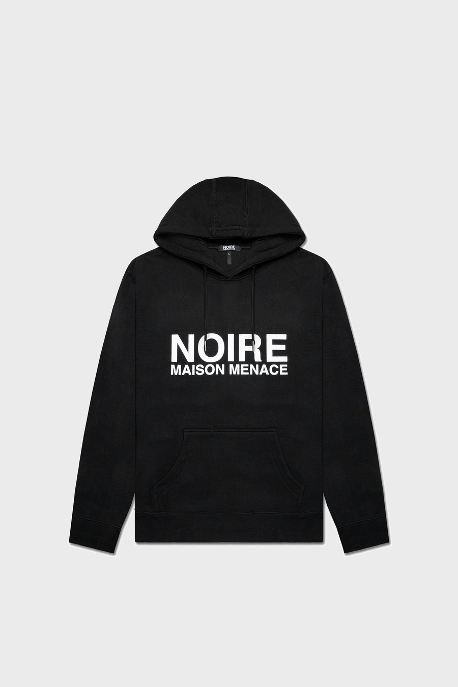 The Noire Classic Hoodie from MAISON MENACE features NOIRE MAISON MENACE in bold white letters on the front of an organic cotton pullover. Its plain gray background combines modern style with eco-friendly design.