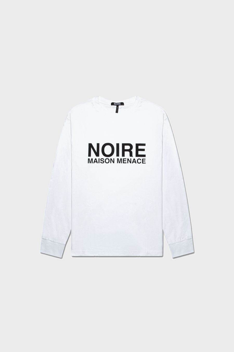 The Noire Classic Long Sleeve Shirt by MAISON MENACE is a white t-shirt made from organic American Grown SUPIMA® cotton, featuring NOIRE MAISON MENACE in black text on the front, shown against a plain background.